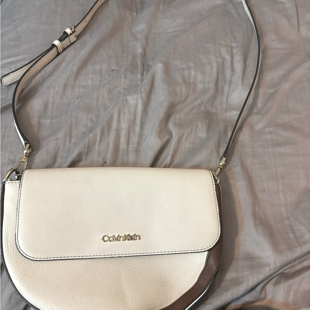 White and brown Calvin Klein purse